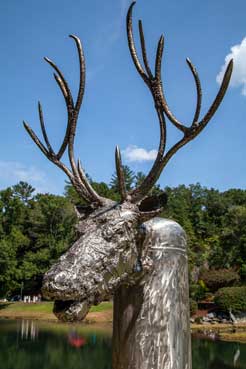 sculpture of a stag with antlers